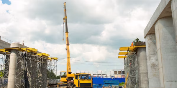 truck-crane-construction-site-construction-transport-bridge_327697-957